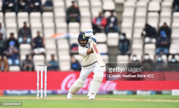 Virat Kohli of India drives the ball while batting during Day 2 of the ICC World Test Championship Final between India and New Zealand at Hampshire...