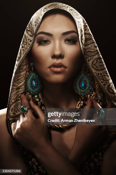 elegant asian woman in traditional hijab with jewelry - bridal makeup stock pictures, royalty-free photos & images