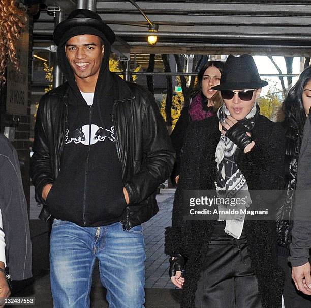 Madonna and her boyfriend Brahim Zaibat arrive for Kabbalah service in New York City on November 12, 2011 in New York City.