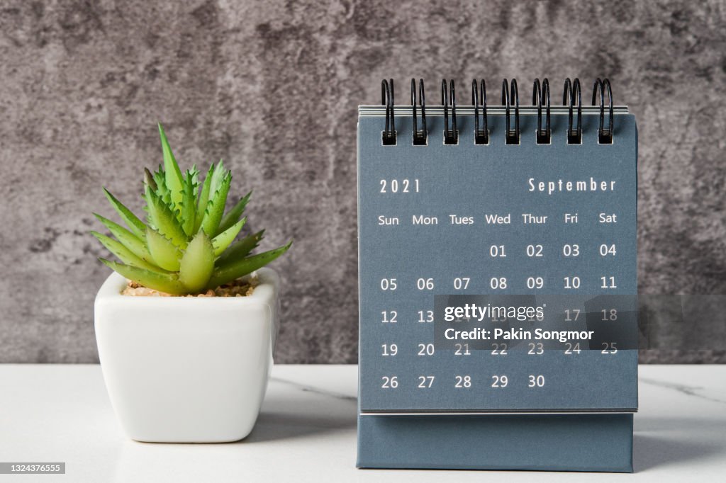 September month, Calendar desk 2021 for organizer to planning and reminder on the table. Business planning appointment meeting concept