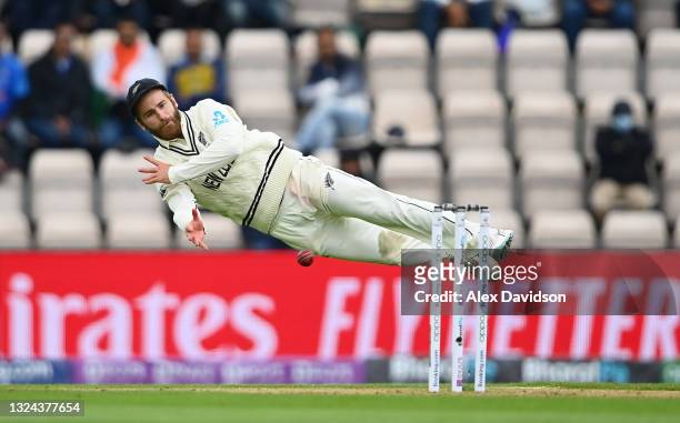 Kane Williamson of New Zealand attempts to run out Ajinkya Rahane of of India during Day 2 of the ICC World Test Championship Final between India and...
