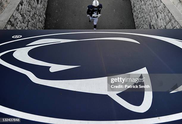 Penn State player runs into the locker room before taking on Nebraska at Beaver Stadium on November 12, 2011 in State College, Pennsylvania.