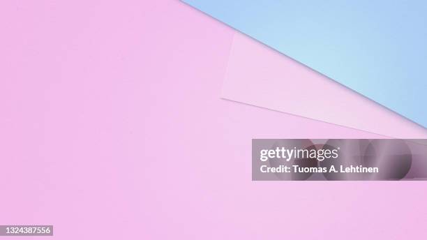 clean sheets of pink and turquoise overlapped papers. - page divider stock pictures, royalty-free photos & images