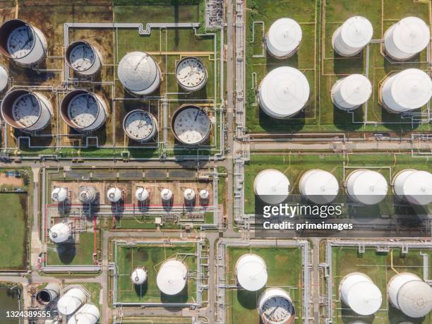 global warming pipes pollute industry atmosphere with smoke ecology pollution, industrial factory pollutes, smoke stacks exhaust pipes,top industry sources the world's polluting indust. - storage container stock pictures, royalty-free photos & images