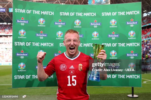 Laszlo Kleinheisler of Hungary celebrates with their Heineken "Star of the Match" award after the UEFA Euro 2020 Championship Group F match between...
