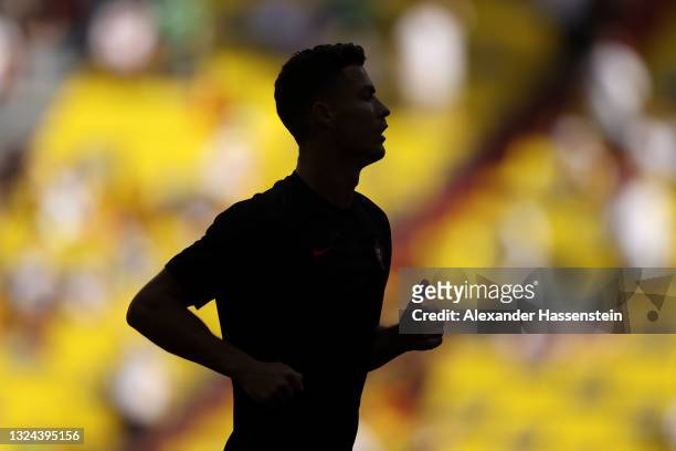 Silhouette of Cristiano Ronaldo of Portugal during the warm up prior to the UEFA Euro 2020 Championship Group F match between Portugal and Germany at...