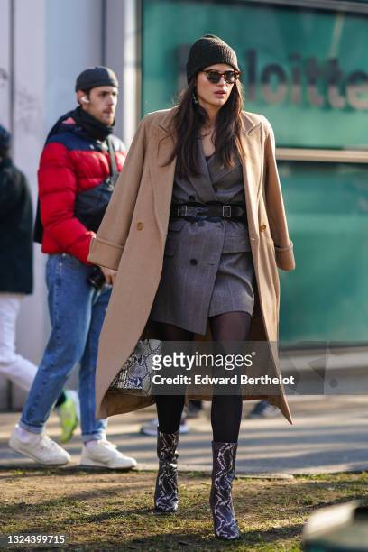 Man with brown Louis Vuitton backpack and black padded jacket before  Frankie Morello fashion show, Milan Fashion Week street style – Stock  Editorial Photo © AndreaA. #272367824