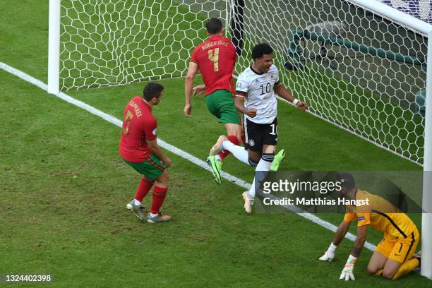 Serge Gnabry of Germany celebrates their side's second goal, an own goal by Raphael Guerreiro of Portugal during the UEFA Euro 2020 Championship...