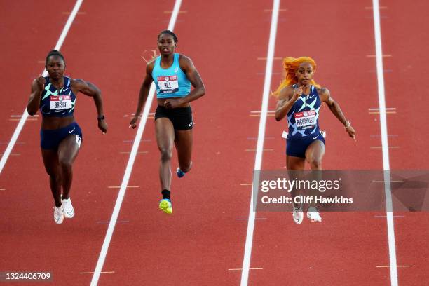 Sha'Carri Richardson competes in the first round of the Women's 100 Meter during day one of the 2020 U.S. Olympic Track & Field Team Trials at...