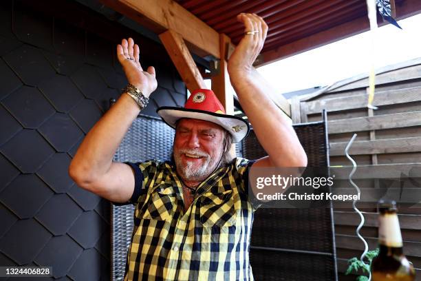 Fan react on the UEFA EURO 2020 match between Germany and Portugal at garden plot Hohe Birk on June 19, 2021 in Essen, Germany. Due to Covid-19...