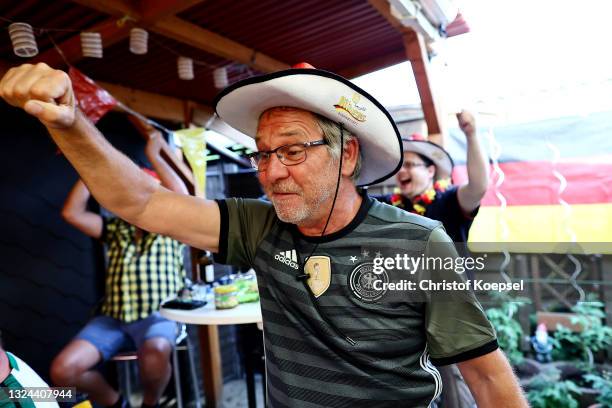 Fan reacts on the UEFA EURO 2020 match between Germany and Portugal at garden plot Hohe Birk on June 19, 2021 in Essen, Germany. Due to Covid-19...