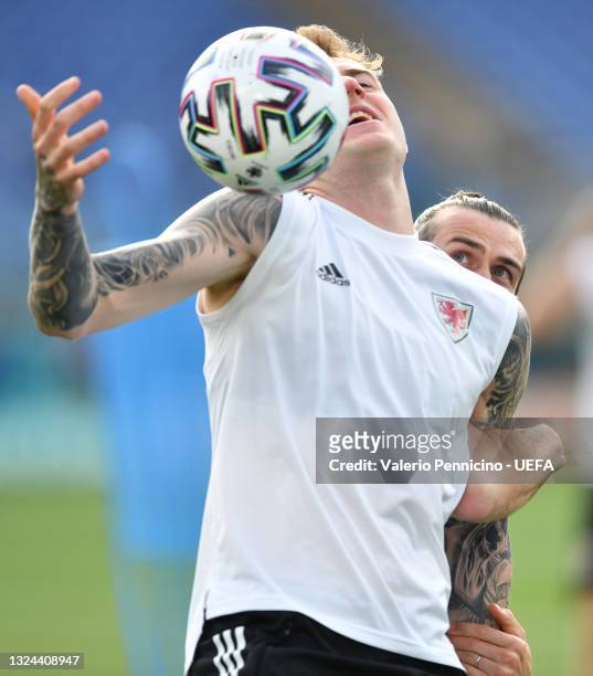 Joe Rodon of Wales controls the ball whilst team mate Gareth Bale looks on during the Wales Training Session ahead of the UEFA Euro 2020 Group A...