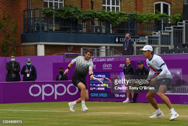 Cameron Norrie of Great Britain, playing partner of Alex de Minaur of Australia plays a forehand during his Semi-final match against Reilly Opelka of...
