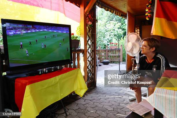 Fan reacta on the UEFA EURO 2020 match between Germany and Portugal at garden plot Hohe Birk on June 19, 2021 in Essen, Germany. Due to Covid-19...