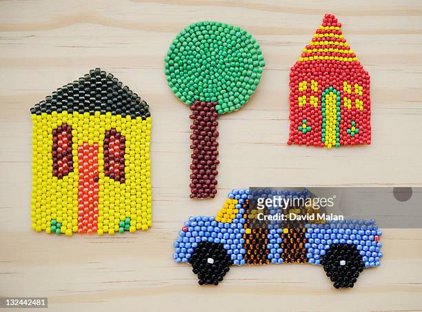 beaded houses & a car (on wood) - beads stock pictures, royalty-free photos & images