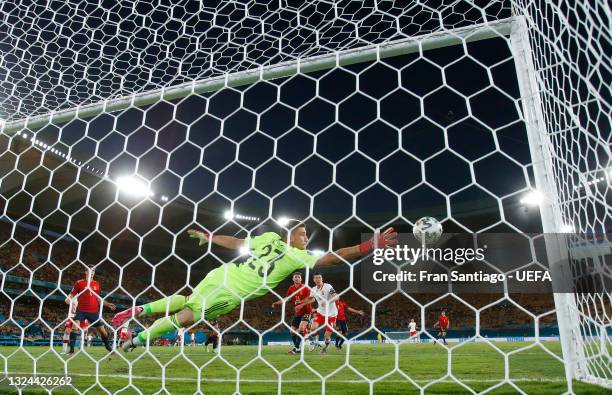Robert Lewandowski of Poland scores their side's first goal past Unai Simon of Spain during the UEFA Euro 2020 Championship Group E match between...