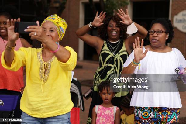 Spectators watch a parade to celebrate Juneteenth on June 19, 2021 in Annapolis, Maryland. Juneteenth marks the end of slavery in the United States...