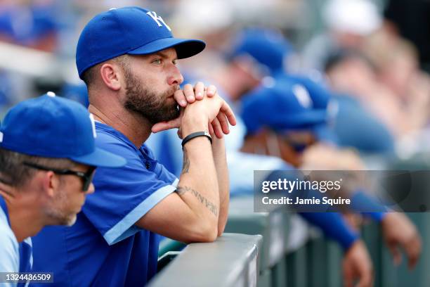 Pitcher Danny Duffy of the Kansas City Royals watches from the dugout during the game against the Boston Red Sox at Kauffman Stadium on June 19, 2021...