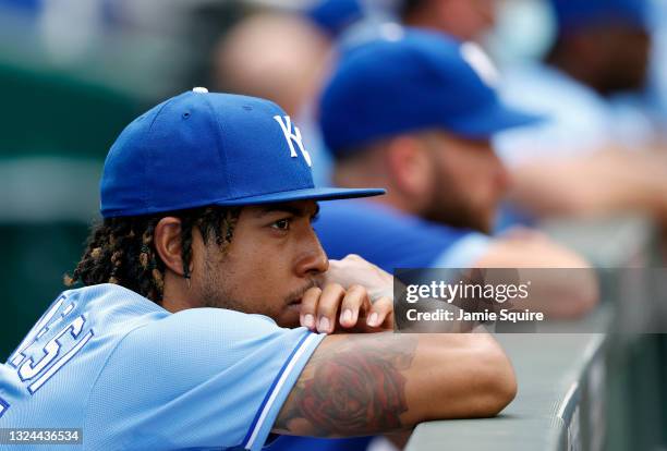 Adalberto Mondesi of the Kansas City Royals watches from the dugout during the game against the Boston Red Sox at Kauffman Stadium on June 19, 2021...