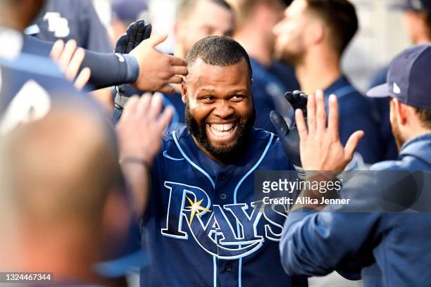 Manuel Margot of the Tampa Bay Rays celebrates with teammates after hitting a home run during the game against the Seattle Mariners at T-Mobile Park...