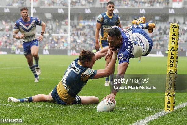 Tuipulotu Katoa of the Bulldogs scores a try during the round 15 NRL match between the Parramatta Eels and the Canterbury Bulldogs at Bankwest...