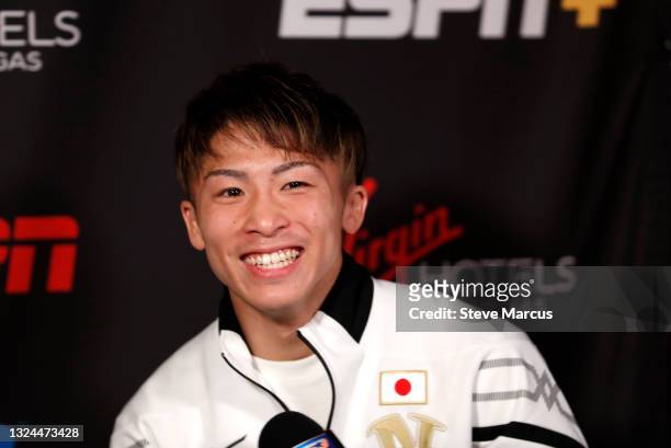 Bantamweight champion Naoya Inoue of Japan smiles during a post-fight interview after defeating Michael Dasmarinas of Philippines in a title defense...