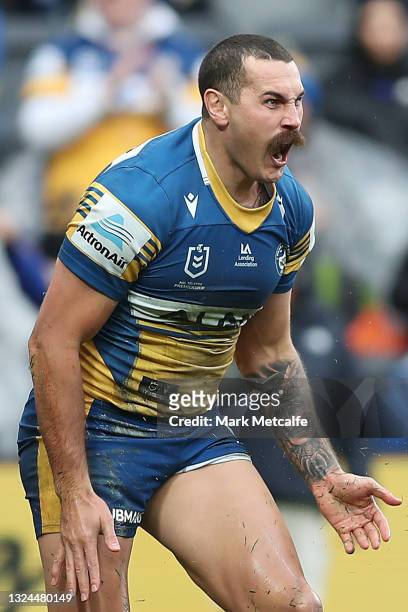 Reagan Campbell-Gillard of the Eels celebrates scoring a try during the round 15 NRL match between the Parramatta Eels and the Canterbury Bulldogs at...