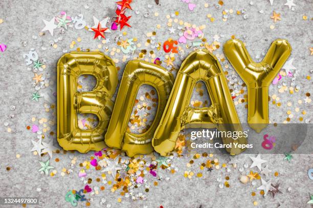 happy birthday in golden balloon with glitter confetti - birthday banner stock pictures, royalty-free photos & images