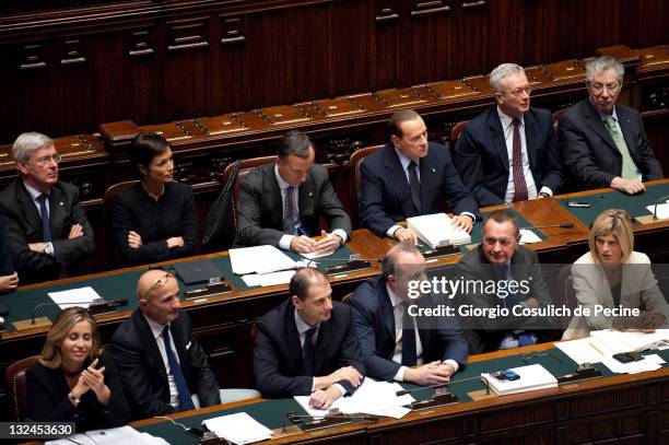 Italian Prime Minister Silvio Berlusconi attends with his government the vote for the 2012 Budget Law at the Chambers of Deputies, on November 12,...