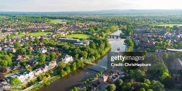 aerial view of river dee in chester including queens park bridge and the old dee bridge, cheshire, england, uk - dee stockfoto's en -beelden