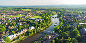 Aerial view of River Dee in Chester including Queens Park Bridge and The Old Dee Bridge, Cheshire, England, UK
