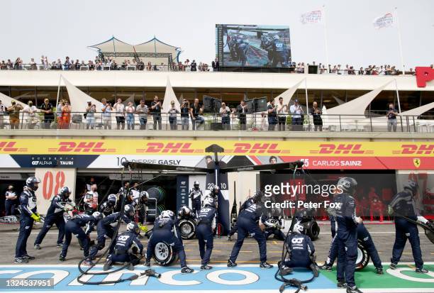 The Scuderia AlphaTauri pit crew prepare for a pitstop during the F1 Grand Prix of France at Circuit Paul Ricard on June 20, 2021 in Le Castellet,...