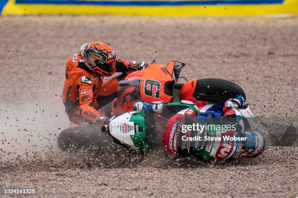 Alex Marquez of Spain and LCR Honda CASTROL crashes with Danilo Petrucci of Italy and Tech 3 KTM Factory Racing during the MotoGP Liqui Moly Motorrad...