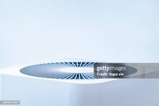 circular grid of exhaust vents - fan blowing stock pictures, royalty-free photos & images