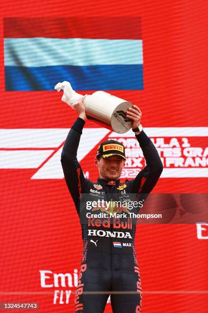 Race winner Max Verstappen of Netherlands and Red Bull Racing celebrates on the podium during the F1 Grand Prix of France at Circuit Paul Ricard on...