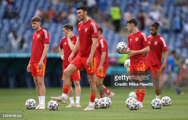 Kieffer Moore of Wales looks on as he warms up prior to the UEFA Euro 2020 Championship Group A match between Italy and Wales at Olimpico Stadium on...