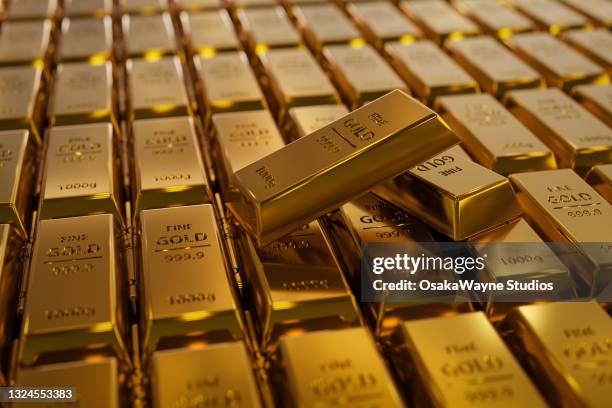 close-up of gold bars - barren stock-fotos und bilder