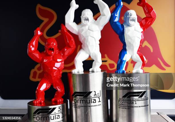 The race winners trophies of Max Verstappen of Netherlands and Red Bull Racing and third placed Sergio Perez of Mexico and Red Bull Racing are...