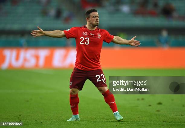 Xherdan Shaqiri of Switzerland celebrates after scoring their team's second goal during the UEFA Euro 2020 Championship Group A match between...