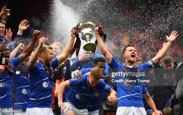 Nicky Featherstone and Ryan Donaldson of Hartlepool United lift the Vanarama National League Trophy during the Vanarama National League Play-Off...