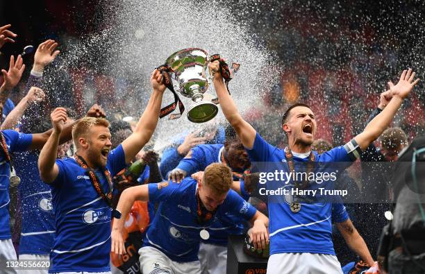 Nicky Featherstone and Ryan Donaldson of Hartlepool United lift the Vanarama National League Trophy during the Vanarama National League Play-Off...