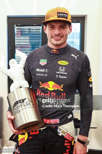 Race winner Max Verstappen of Netherlands and Red Bull Racing holds his trophy as he celebrates after winning the F1 Grand Prix of France at Circuit...