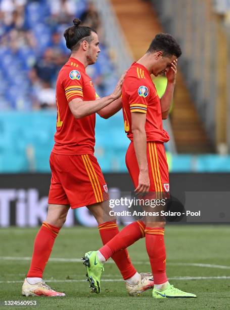 Ethan Ampadu of Wales looks dejected after he is shown a red card by Match Referee, Ovidiu Hategan during the UEFA Euro 2020 Championship Group A...