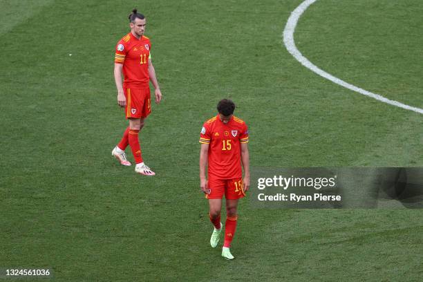 Ethan Ampadu of Wales looks dejected after he is shown a red card by Match Referee, Ovidiu Hategan during the UEFA Euro 2020 Championship Group A...