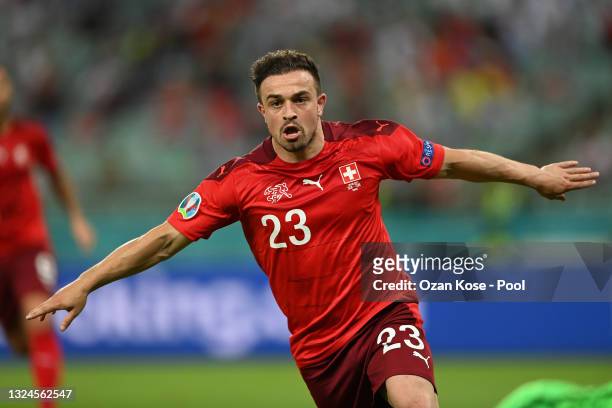 Xherdan Shaqiri of Switzerland celebrates after scoring their team's third goal during the UEFA Euro 2020 Championship Group A match between...