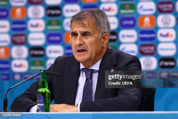 In this handout picture provided by UEFA, Senol Gunes, Head Coach of Turkey speaks to the media during the Turkey Press Conference after the UEFA...