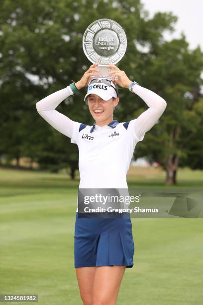 Nelly Korda poses with the trophy after winning the Meijer LPGA Classic for Simply Give at Blythefield Country Club on June 20, 2021 in Grand Rapids,...