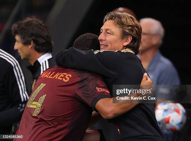 Manager Gabriel Heinze of the Atlanta United celebrates with Anton Walkes after his goal against the Philadelphia Union during the second half at...