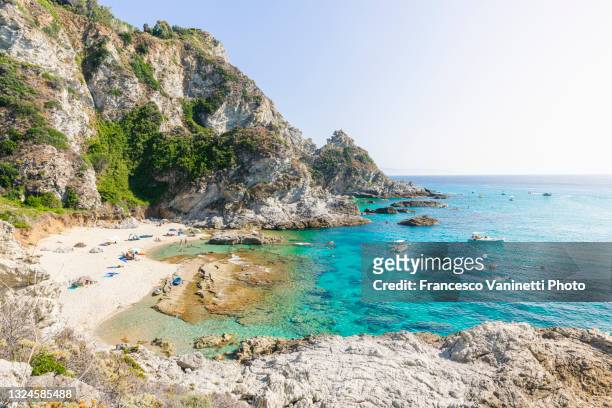 the beaches of praia i focu in summer, capo vaticano, calabria, italy. - kalabrien stock-fotos und bilder