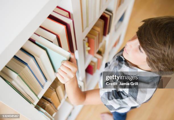Take Off Book 56 Taking Book Off Shelf Stock Photos, High-Res Pictures, and Images ...